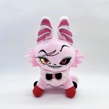 Diferentes muñecos de peluche de gatos bicolores y coloridos con moño