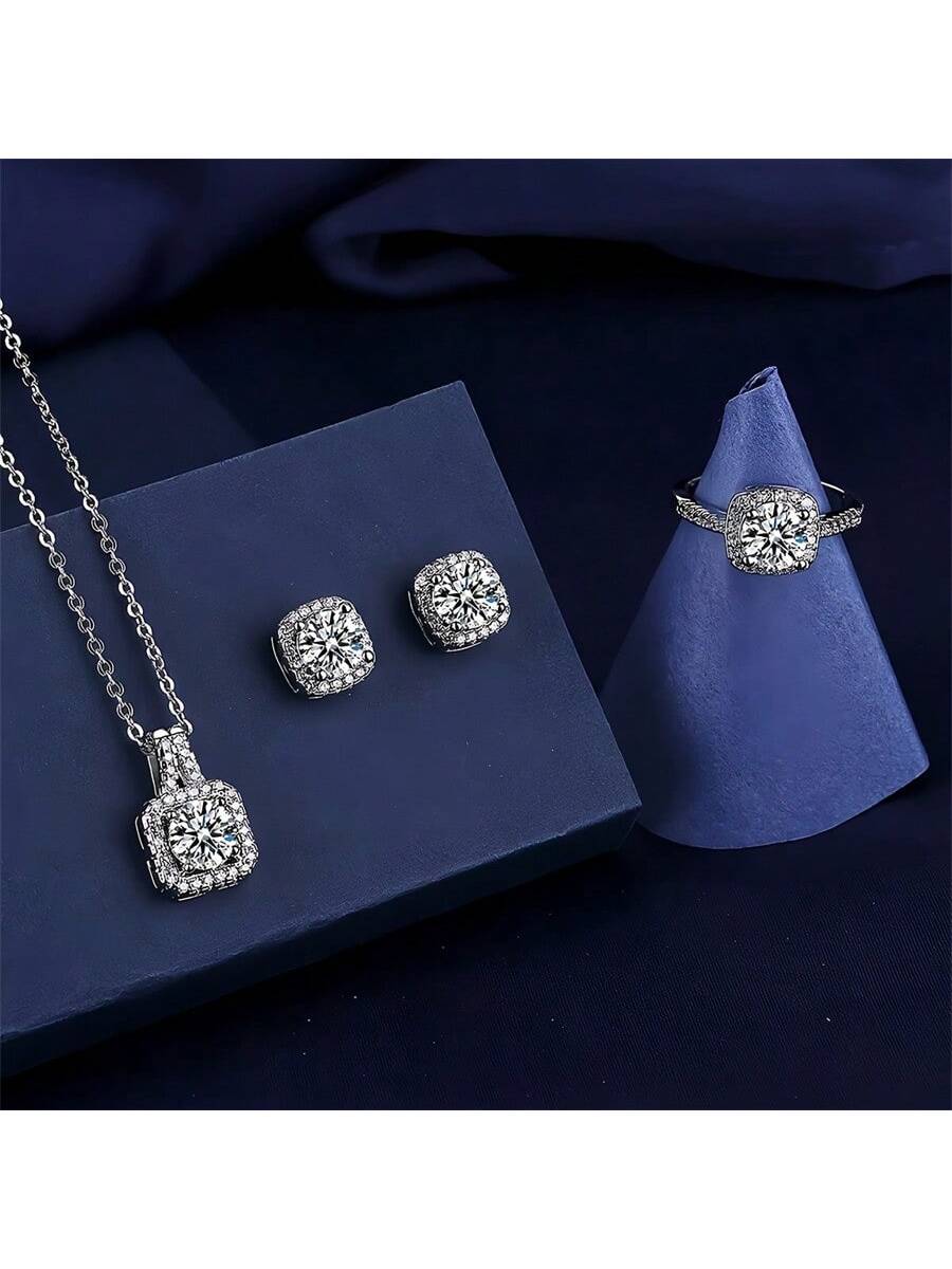 مجموعة تتكون من 4 قطع، اقراط وعقد وخاتم مرصع بالزر...