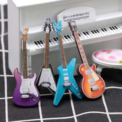 1 pièce Mini Guitare Jouet, Style et Couleur Aléatoires, Guitare Électrique Simulée, Petit Accessoire de Scène, Accessoire de Maison de Poupée, Décoration DIY de Maison de Poupée, Cadeau d'Halloween/Noël