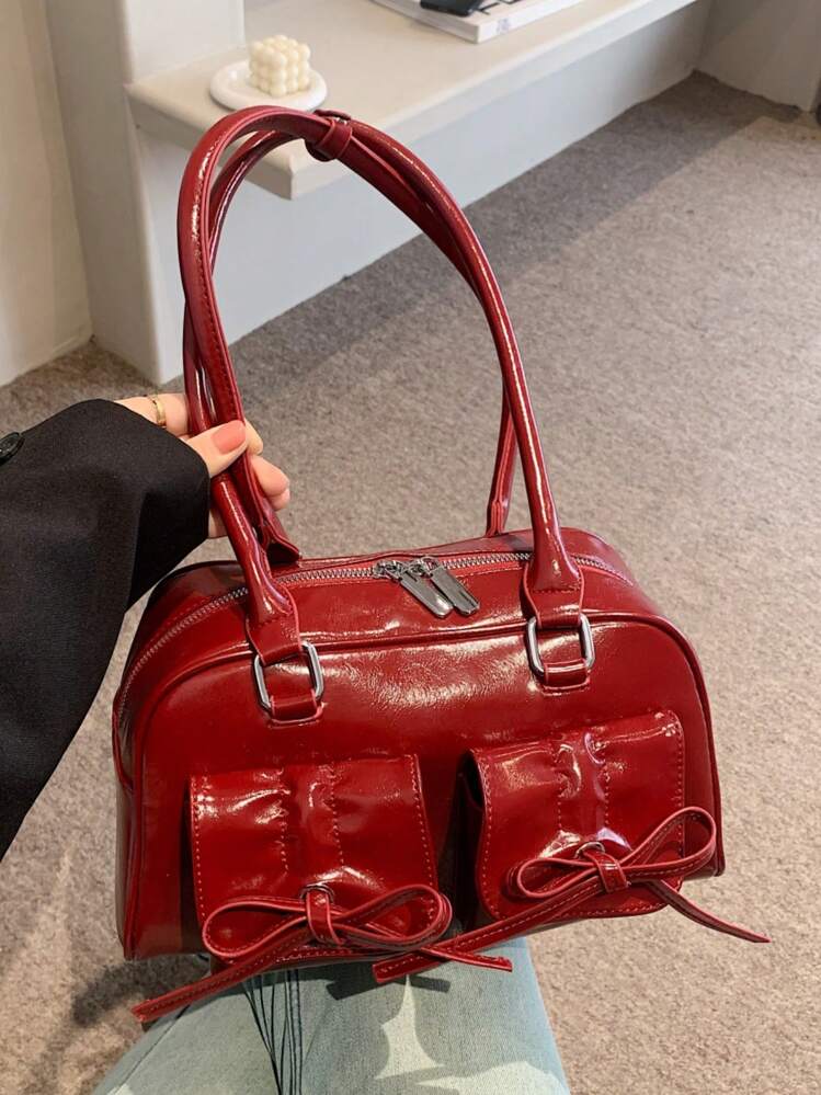 赤いバックの少女 X-girl（エックスガール）の「OVAL LOGO FAUX LEATHER 2WAY MINI BAG