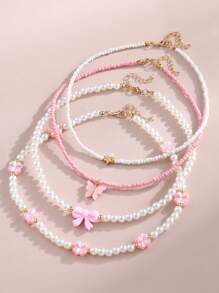 Set de 4 collares con mariposas y flores de perlas y cuentas para niñas