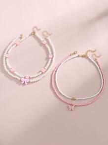 Set de 4 collares con mariposas y flores de perlas y cuentas para niñas