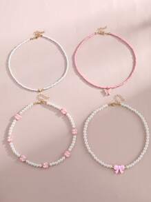 Set de 4 collares con mariposas y flores de perlas y cuentas para niñas