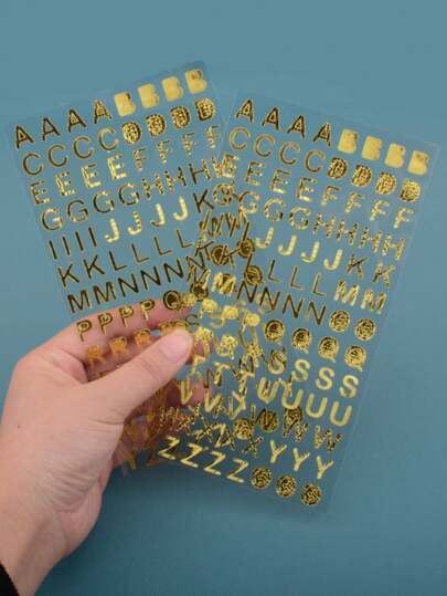 1 件闪闪发光的金色烫印字母涂鸦剪贴簿贴纸 - 自粘、不对称形状、图形图案，适用于相册、日记、卡片制作、DIY 工艺品、水瓶、笔记本电脑、手机壳装饰 - 一次性使用，可在木质表面重复使用，开学季适用
