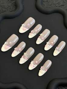 Bộ móng tay bấm thủ công kiểu Pháp hình quả hạnh nhân theo phong cách Y2K, dụng cụ bấm móng tay, phụ kiện trang trí bất đối xứng như hoa và đá giả, phù hợp cho phụ nữ và trẻ em gái, phù hợp cho tiệc tùng, khiêu vũ và đeo hàng ngày, mỗi bộ gồm 10 miếng dán móng tay, ba kích cỡ và một bộ dụng cụ. (Lưu ý: Màu sắc trang sức móng tay là ngẫu nhiên), một món quà tuyệt vời cho phụ nữ và trẻ em gái. - trắng - Xem 2