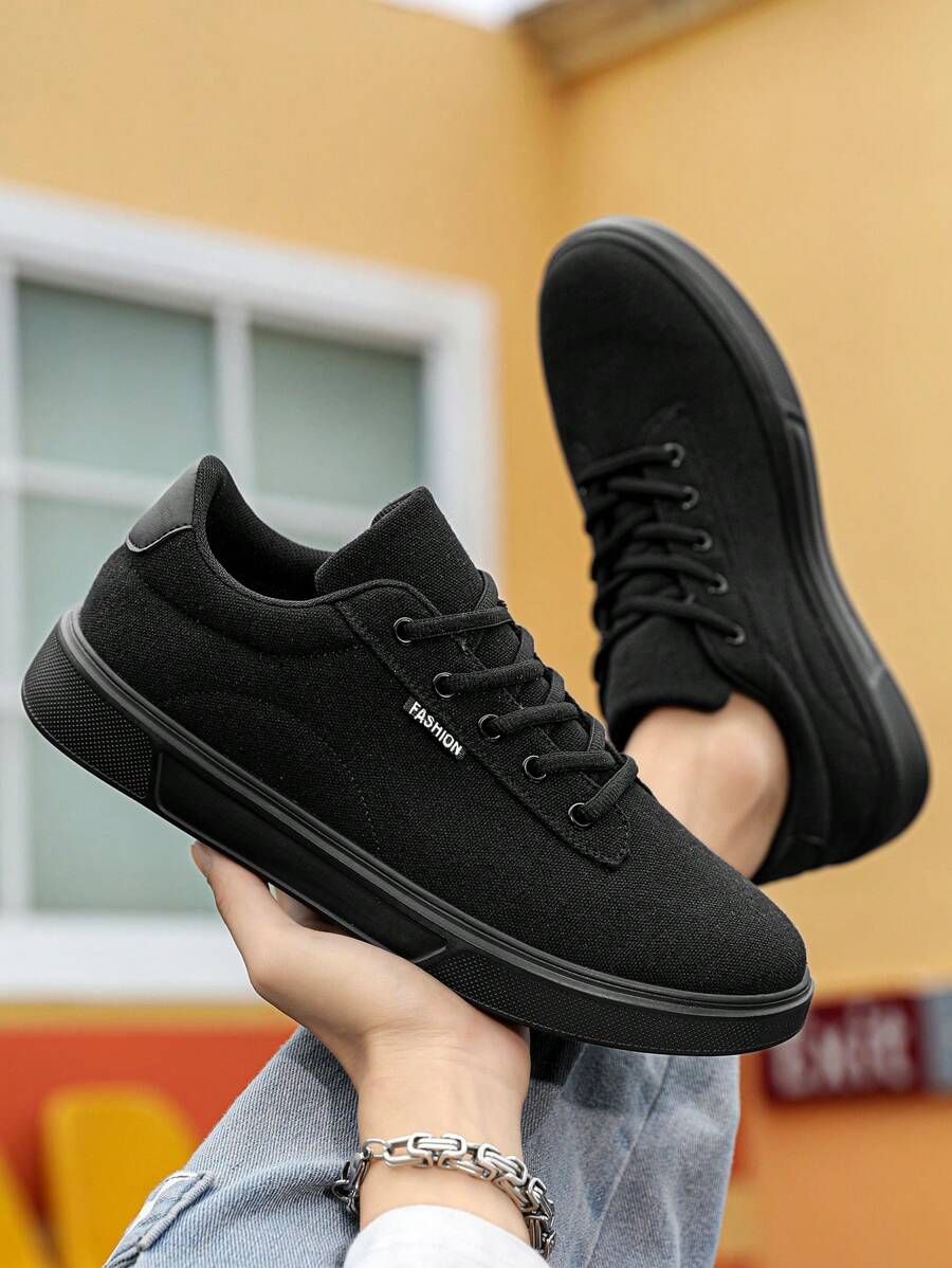 Zapatos casuales con cordones para hombres, tenis cómodos de color negro clásico, zapatos formales de unicolor minimalista