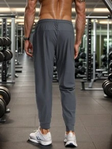 Pantalones de sudadera casuales y cómodos de verano para hombres con bolsillo con cremallera, cintura ajustable y detalles reflectantes, para entrenamiento