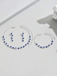 1 Set de joyas de 3 piezas con collar, pulsera y aretes con cristal azul de strass con diseño ondulado