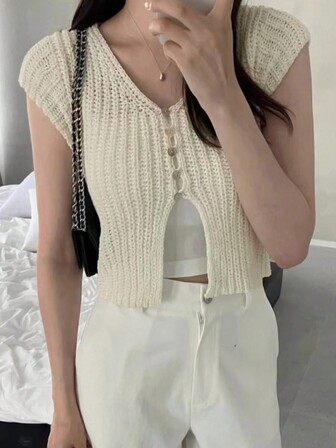 V领纽扣镂空短袖开衫，百搭休闲办公装，显瘦