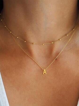 2 piezas Conjunto de collares con colgante de letra del alfabeto de 26 en acero inoxidable dorado, estilo minimalista elegante, regalo de joyería de moda para novia, esposa, madre, familia, amigos, cumpleaños, aniversario, popular entre mujeres jóvenes