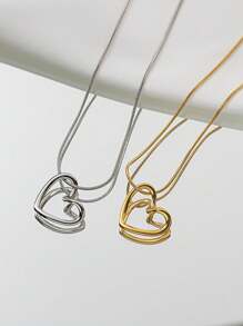1 paquet Pendentif courbé en forme de cœur creux doré ou argenté à la mode en acier inoxydable. Cadeau de bijoux pour femmes avec chaîne en forme d'os de serpent. Saint-Valentin