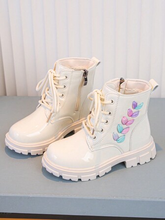 1 par de nuevas botas de moda con rayas de trenzado de color llamativo