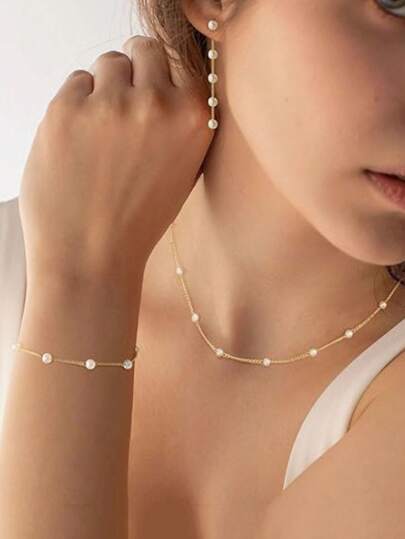 1 pieza Elegante conjunto de joyería clásica de perlas falsas y oro para mujer, que incluye collar, aretes y pulsera de perlas falsas y oro. Joyería exquisita para bodas, fiestas y uso diario. Regalo de Navidad y Invierno.