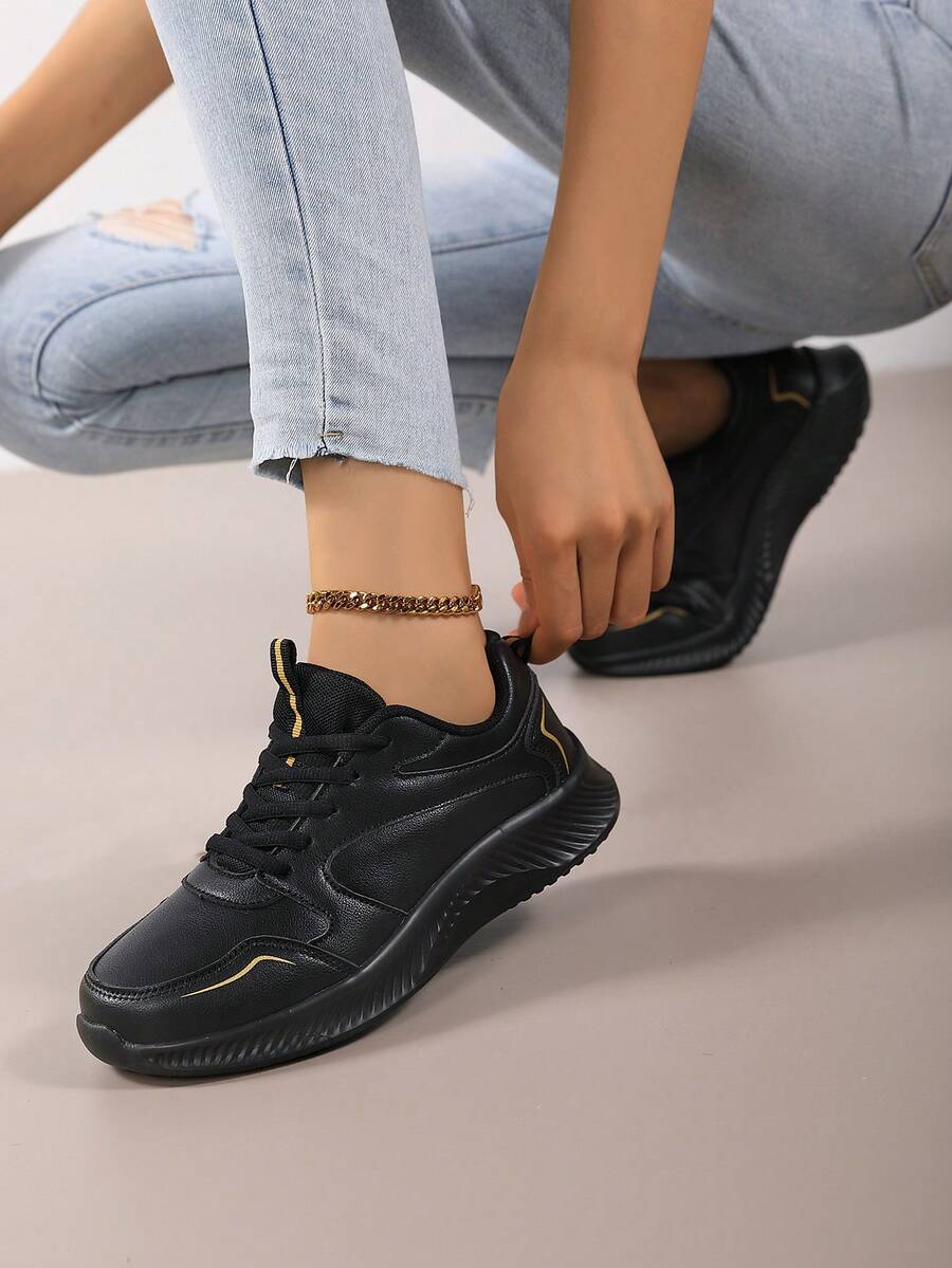 Zapatillas casuales para mujer en negro y dorado, zapatos deportivos ligeros y amortiguadores, zapatillas gruesas versátiles para primavera/otoño. Zapatos deportivos de cuero negro y dorado para mujer, suela blanda y cómoda para mamá, zapatos casuales ligeros y transpirables para el trabajo. Nuevas zapatillas de cuero negro y dorado para mujer, zapatos casuales con plataforma, zapatos deportivos ligeros y versátiles para estudiantes - Negro - Ver 1