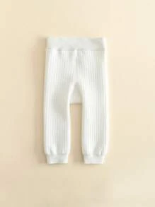 1 件纯色女童保暖紧身裤，黑色和白色，秋冬