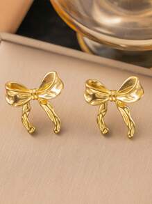 1 paire de boucles d'oreilles à nœud papillon métalliques élégantes, à porter au quotidien pour la Saint-Valentin