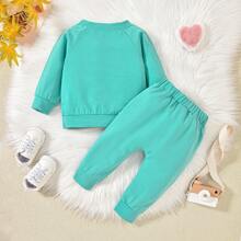 2 piezas Conjunto de sudadera de manga larga con estampado de letras y pantalones para niñas