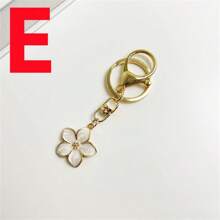 Flower Charm Keychain Holiday Style Cute Colorful Floral Design Key Ring Holder Car Bag Pendant Ornaments For Women Souvenir Birthday Gift Floral Design Bag Charm Fashion Bag Accessories Shoulder Bag Crossbody Bag Handle Bag Handbag Party Holiday Gift Birthday Valentine's Day Stylish Fashion Minimalist For Teen Girls Women College Students Teacher Gift Accessories Decor Funny Gifts, Funny Gift Car Accessories Women Key Chain Charms School Supplies Teacher Gifts Back To School Teacher Accessories