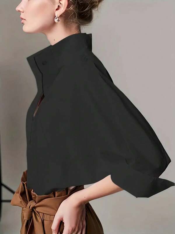 Elegante blusa de manga larga con botones y cuello