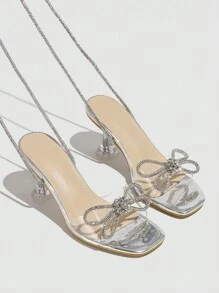 女士露趾露齿性感绑带水钻蝴蝶结闪亮夏季透气穆勒派对透明凉鞋中跟银色