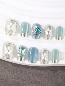 10件套，薄荷蓝，短梯型，按压式美甲，手工制作，设计优雅大方，高端法式风格，凝胶抛光，闪光，猫眼效果，金属光泽，全覆盖假指甲尖，各种形状的3D大水钻，配有1管果冻胶，1个手指按压式指甲棒和1个抛光带。适合派对，旅行，跳舞，日常穿着和送给朋友的礼物，女士美甲用品，可重复使用。