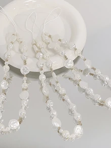 1 pieza Brazalete vintage elegante clásico con perla decorativa asimétrica y cuentas doradas, estilo de cerámica negra mate lindo, cadena para teléfono minimalista juvenil encantadora, llavero, correa para auriculares, cuentas de perla de tulipán coloridas y juveniles, correa colgante para funda de teléfono minimalista y bonita para niña, brazalete de perlas 3D transparente con degradado floral, accesorios de joyería personalizados minimalistas y degradados