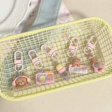 5 piezas Llaveros de osito musical rosa, lindos regalos con colgantes de bolso de dibujos animados para amigos, accesorios para coche, encantos para mochilas escolares