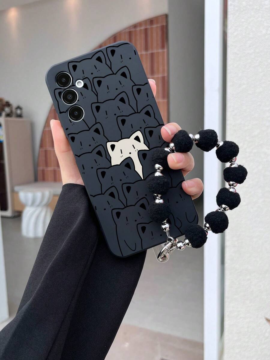 1 个黑色 TPU 手机壳，带黑白猫图案，具有防撞保护作用，1 个配套黑色毛绒球手机带，适用于 iPhone、Galaxy、Redmi、OPPO 手机
