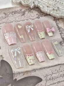 10 pièces/set Pointes d'ongles longs en forme de cercueil, accessoires d'art des ongles exquis faits main. Comprenant : 1 paquet de décalcomanies en forme de nœud papillon en forme de cœur, 1 paquet d'autocollants à fleurs en dentelle, 1 flacon de vernis gel cristal et 1 bloc à polir. Idéal pour les fêtes, les mariages et le port quotidien. Ongles à presser