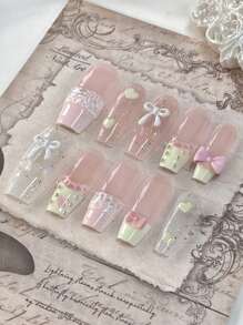 10 pièces/set Pointes d'ongles longs en forme de cercueil, accessoires d'art des ongles exquis faits main. Comprenant : 1 paquet de décalcomanies en forme de nœud papillon en forme de cœur, 1 paquet d'autocollants à fleurs en dentelle, 1 flacon de vernis gel cristal et 1 bloc à polir. Idéal pour les fêtes, les mariages et le port quotidien. Ongles à presser