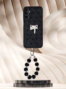 1 个黑色 TPU 手机壳，带黑白猫图案，具有防撞保护作用，1 个配套黑色毛绒球手机带，适用于 iPhone、Galaxy、Redmi、OPPO 手机