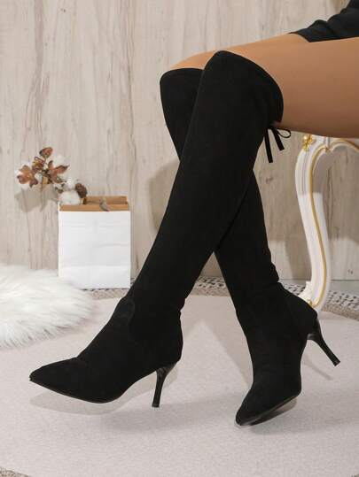 女士纯色高跟靴。时尚过膝一脚蹬时尚靴。女士舒适靴