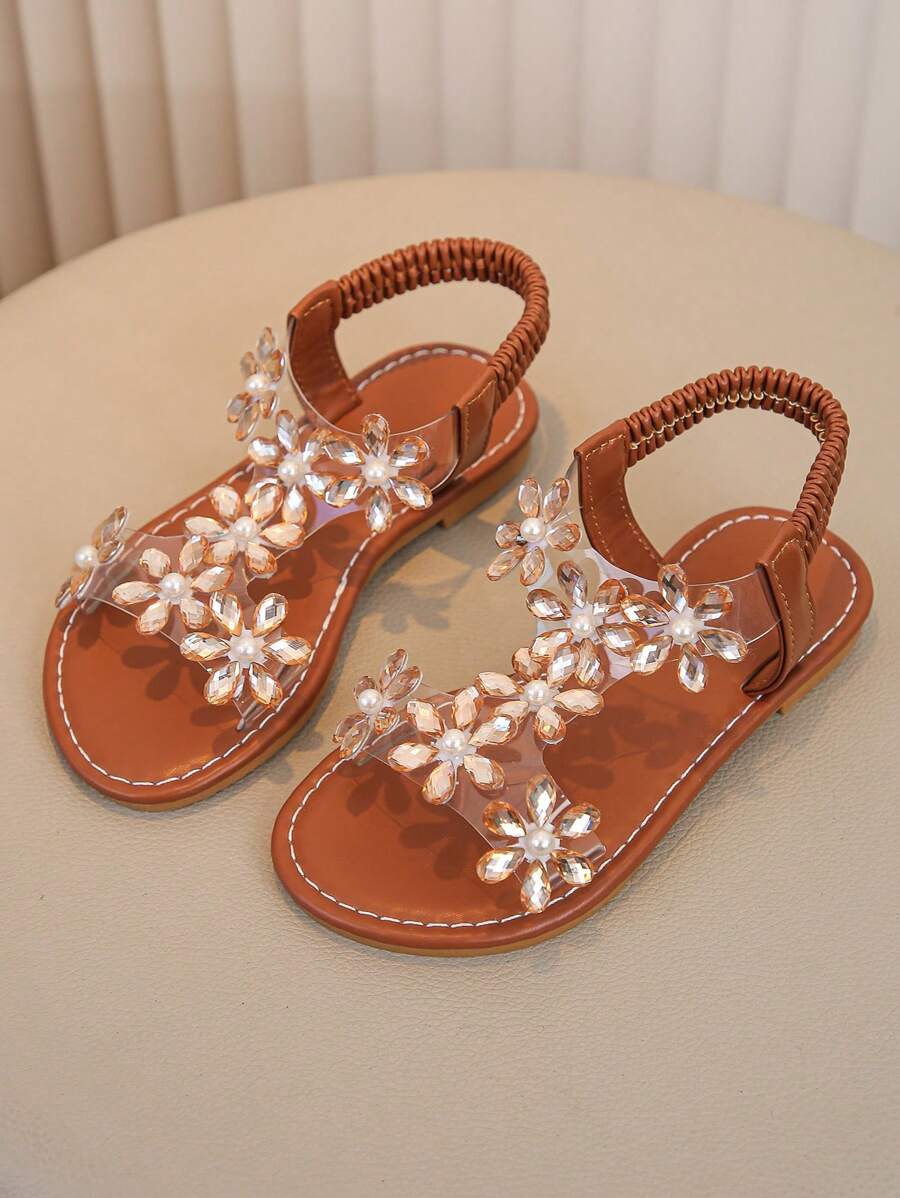 1 par de sandalias para niñas, nueva diseño con cristales, mariposa, flor y hebilla transparente, zapatos planos de princesa para la playa, para niños - Marrón - Ver 1