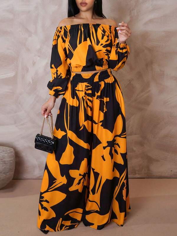 LovelyWholesale Mujeres de tallas grandes Top de hombros descubiertos con estampado gráfico y pantalones de pierna ancha