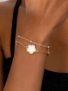 1 brazalete minimalista de flor de cinco hojas para mujer, adecuado para el uso diario y como regalo para amigos - pulsera de flores de cinco hojas - Ver 2