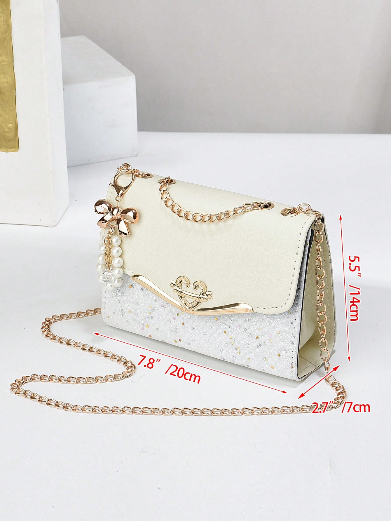 حقيبة كروس بودي مربعة مزينة بالفيونكة والخرز الاصط...