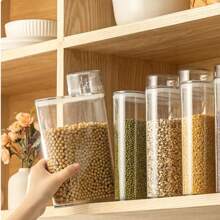 1 件透明密封食品储存罐，容量大，可存放干货、零食、茶、谷物和坚果
