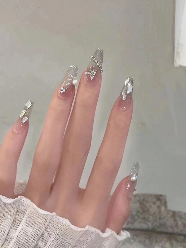 Instantly Update Your Style With This Full Set Of 30 Coffin Shape False Nails. Silver Glitter And Sparkling Rhinestone Decoration Creates A Glamorous European And American Style. The Set Includes 1 Sheet Of Jelly Glue And 1 Nail File. It Is Suitable For Parties, Dance Parties, And Daily Wear. The Nails Are Detachable And Can Be Repeatedly Worn. Press On Nails Nail Supplies