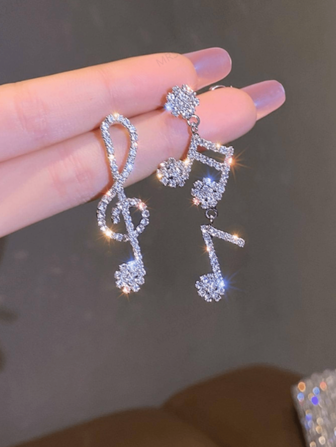 1 par de pendientes de gota de nota musical creativa y lujosa con diseño único y rhinestones brillantes, pendientes de moda de