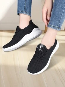 Zapatillas de deporte de tela facial transpirable de color sólido para mujer, zapatos casuales de mujer casual con cordones de punta redonda, cómodos tenis planos antideslizantes, adecuados para deportes, tenis, fitness, ejercicio, ropa casual, uso diario. - Negro - Ver 2