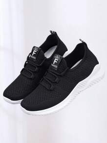Zapatillas de deporte de tela facial transpirable de color sólido para mujer, zapatos casuales de mujer casual con cordones de punta redonda, cómodos tenis planos antideslizantes, adecuados para deportes, tenis, fitness, ejercicio, ropa casual, uso diario. - Negro - Ver 5