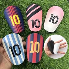 1 par de espinilleras de entrenamiento de fútbol con mini estrellas multicolor de tipo insertado grueso, protector de pantorrillas antichoque