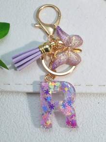 1个字母雪花树脂钥匙扣，女士包包挂饰，蝴蝶流苏礼品，汽车配件，书包配件，带证件夹的挂绳，汽车配件，包包挂饰，送给母亲、父亲、毕业生和老师的礼物 - 紫色 - 查看 25
