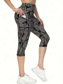 Mallas capri de entrenamiento de talle alto estampadas para mujer con bolsillos y control de abdomen - Negro - Ver 1