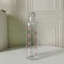 Botella de agua de plástico de gran capacidad con estampado de mariposa y escala de medición, adecuada para la hidratación diaria