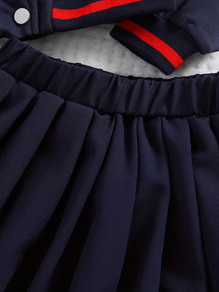 2 piezas Conjunto deportivo para niñas de otoño para exteriores casual, chaqueta de bloque de color con parche de letra y manga estriada, falda plisada de cintura elástica, conjunto de ropa primavera otoño cómoda y transpirable para niña joven