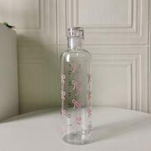 Botella de agua de plástico de gran capacidad con estampado de mariposa y escala de medición, adecuada para la hidratación diaria