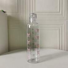 Botella de agua de plástico de gran capacidad con estampado de mariposa y escala de medición, adecuada para la hidratación diaria