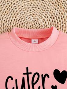 年轻女孩字母印花圆领毛衣和紧身裤两件套，春秋