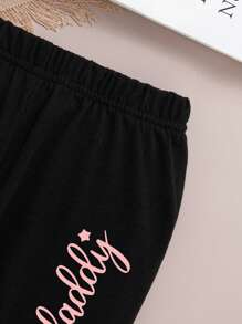 年轻女孩字母印花圆领毛衣和紧身裤两件套，春秋